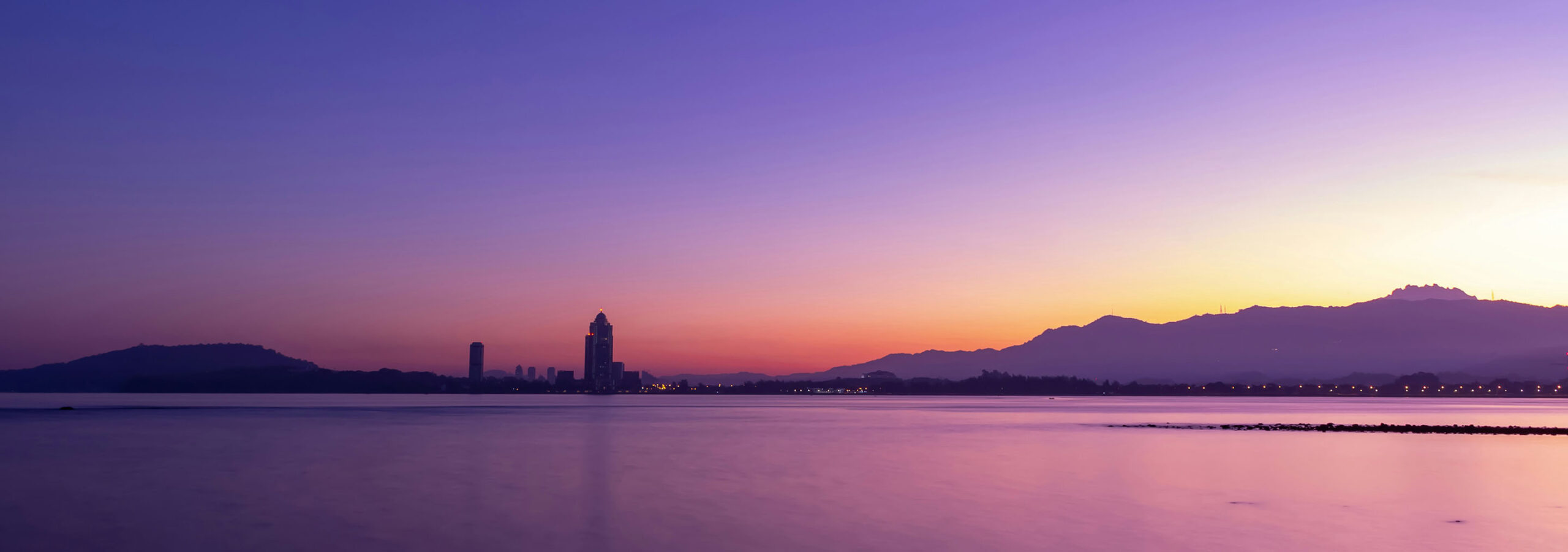 Kota Kinabalu skyline over water